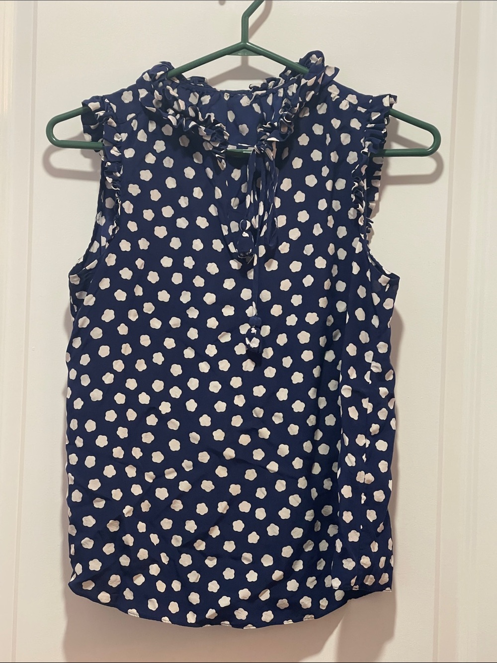 Sleeveless Navy Polka Dot Ruffle Tie-Neck Top